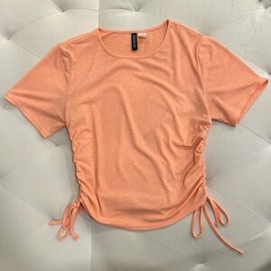 Peach-colored adjustable top